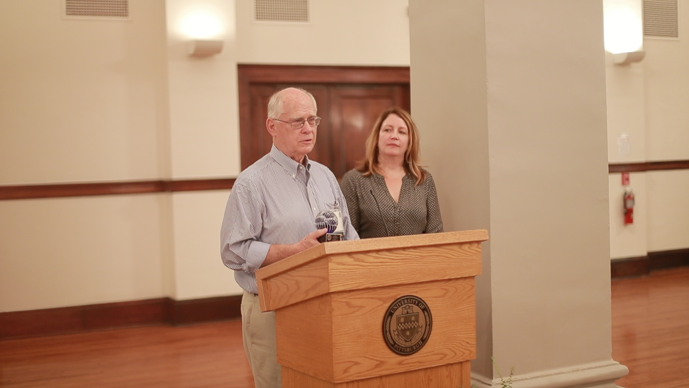 Dr. David Imig being presented with the inaugural David G. Imig Distinguished Service Award