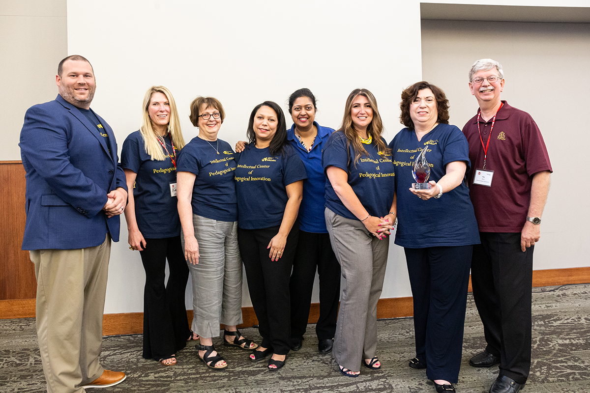 Drexel University EdD faculty team posing with the CPED Program of the Year Award in 2019.